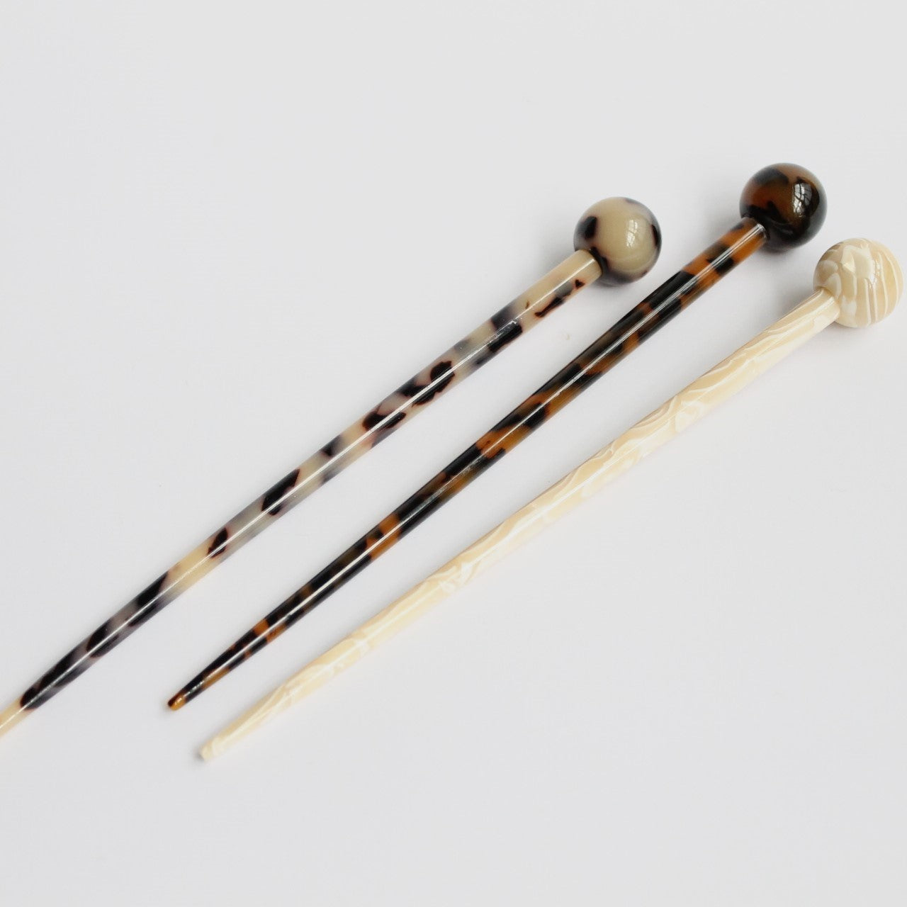 Transforming hair stick tortoise black and beige