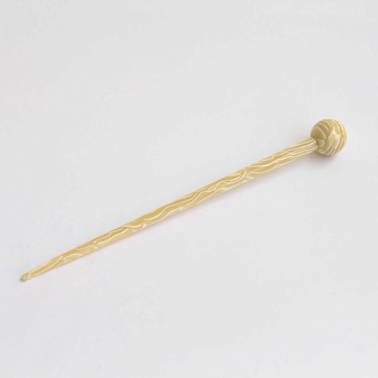 Transforming hair stick beige