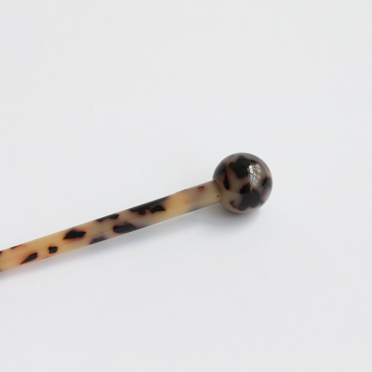 Transforming hair stick tortoise black and beige