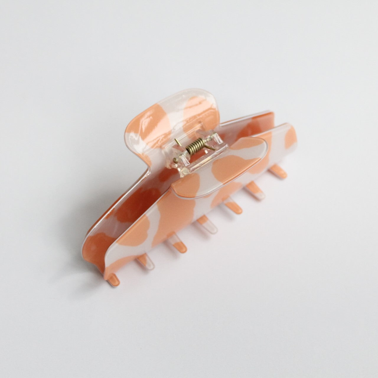 Resilient peach hair claw clip