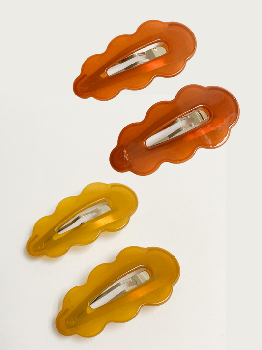 Waved journey bundle of 4 hair clips orange and yellow